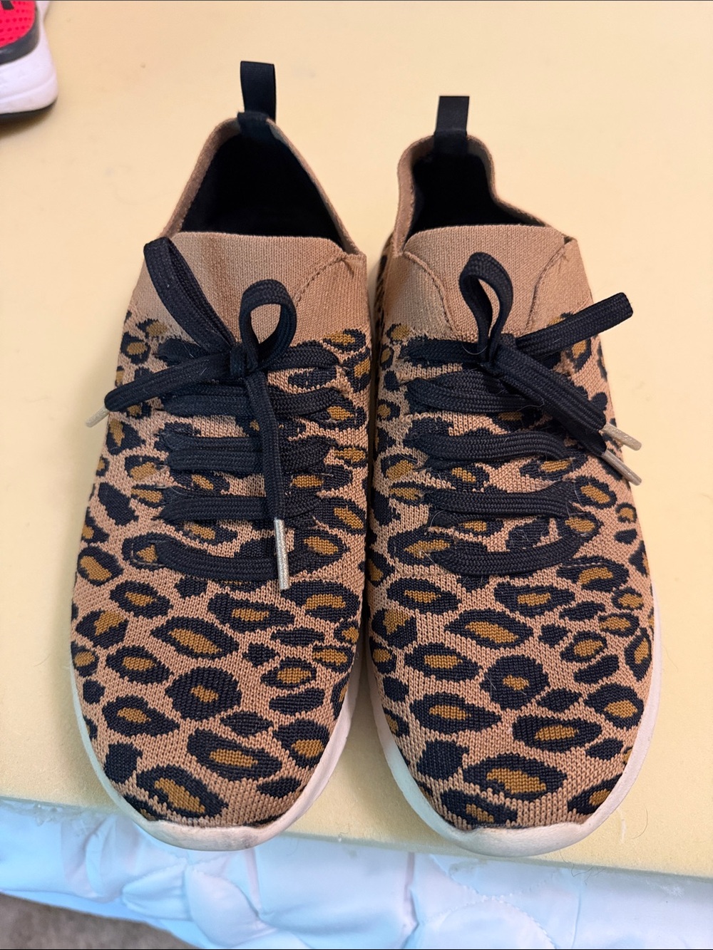 Skechers Leopard Print Knit Slip-On Sneakers in Tan and Black